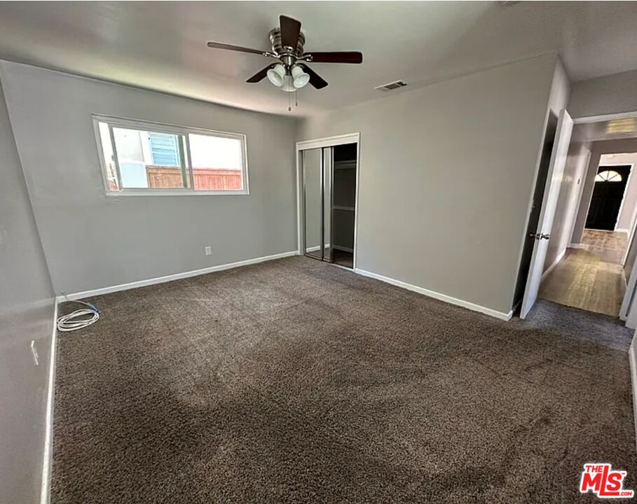 2221 Bataan Road, Unit A Redondo Beach, CA 90278 - Photo 12 of 16 a view of room with a ceiling fan