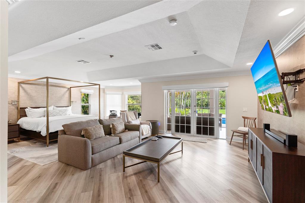 11391 Sundance Lane Boca Raton, FL 33428 - Photo 17 of 58 a living room with furniture large window and wooden floor