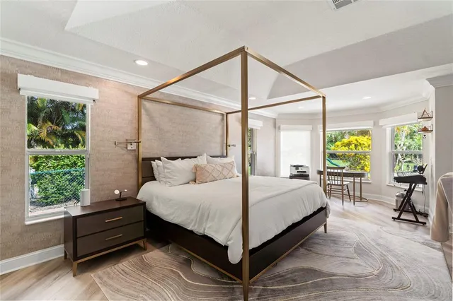 a bathroom with a double vanity sink a mirror and a shower