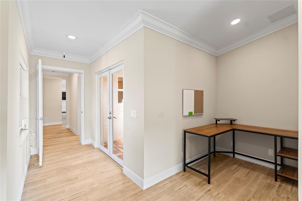 11391 Sundance Lane Boca Raton, FL 33428 - Photo 36 of 58 a view of a hallway with workspace