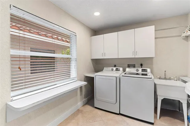 a view of a swimming pool with a chair