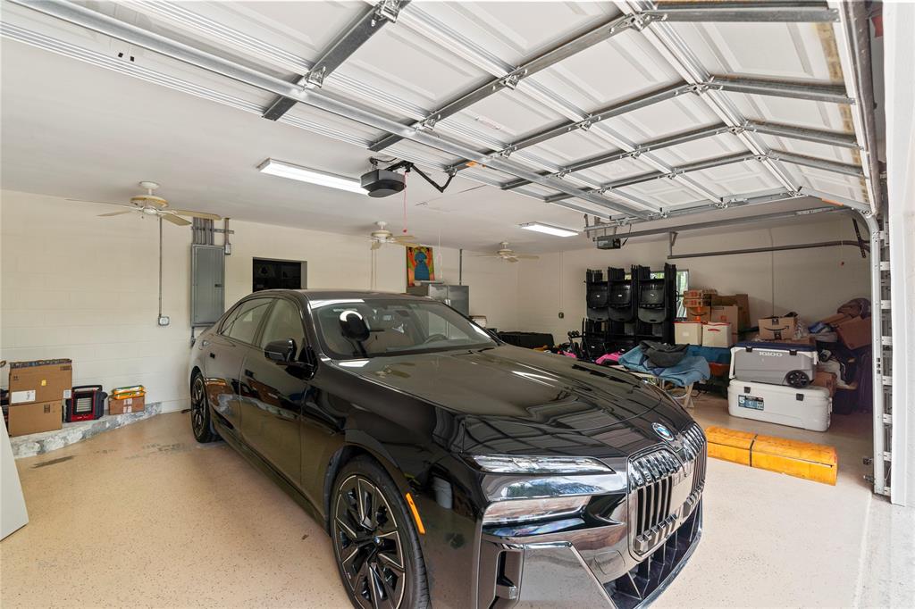 11391 Sundance Lane Boca Raton, FL 33428 - Photo 44 of 58 a view of a car in garage
