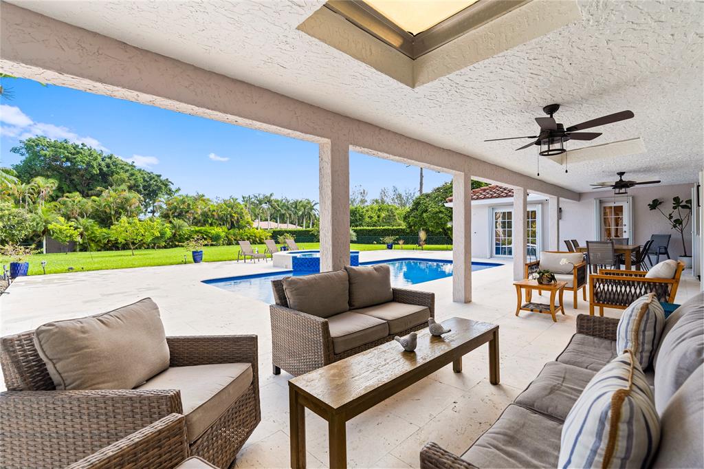 11391 Sundance Lane Boca Raton, FL 33428 - Photo 45 of 58 a living room with furniture and a large window