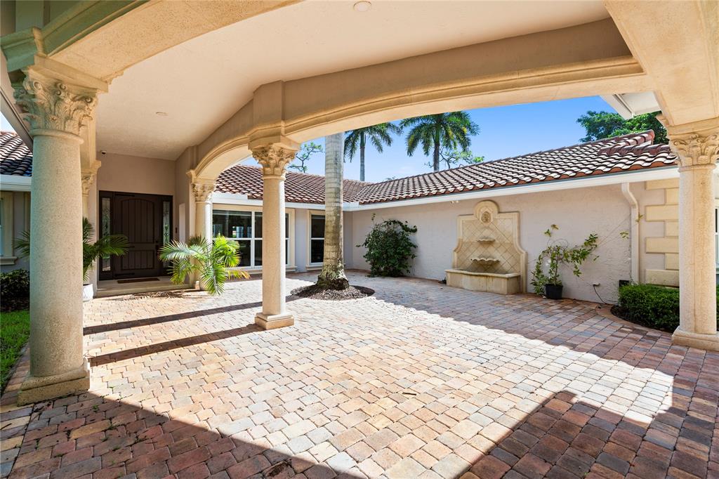 11391 Sundance Lane Boca Raton, FL 33428 - Photo 5 of 58 a view of a house with a patio