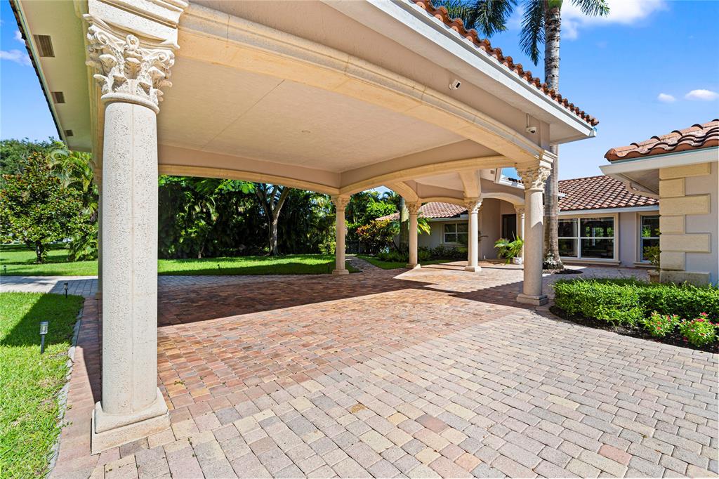11391 Sundance Lane Boca Raton, FL 33428 - Photo 53 of 58 a view of a house with backyard and porch