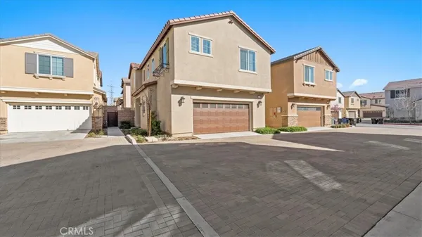 front view of a house with a street