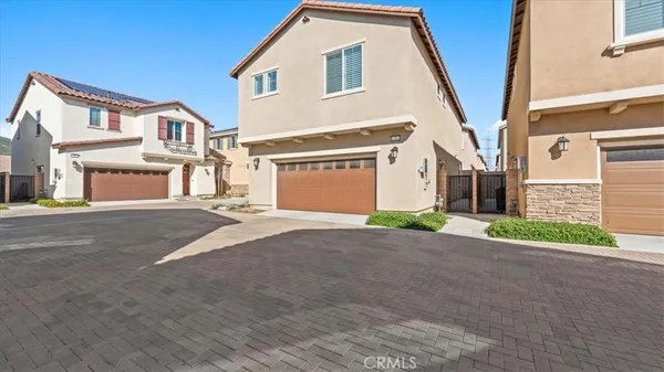a view of a house with a street