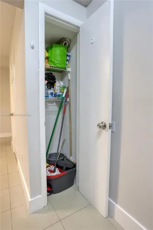 a view of a swimming pool with a lounge chair