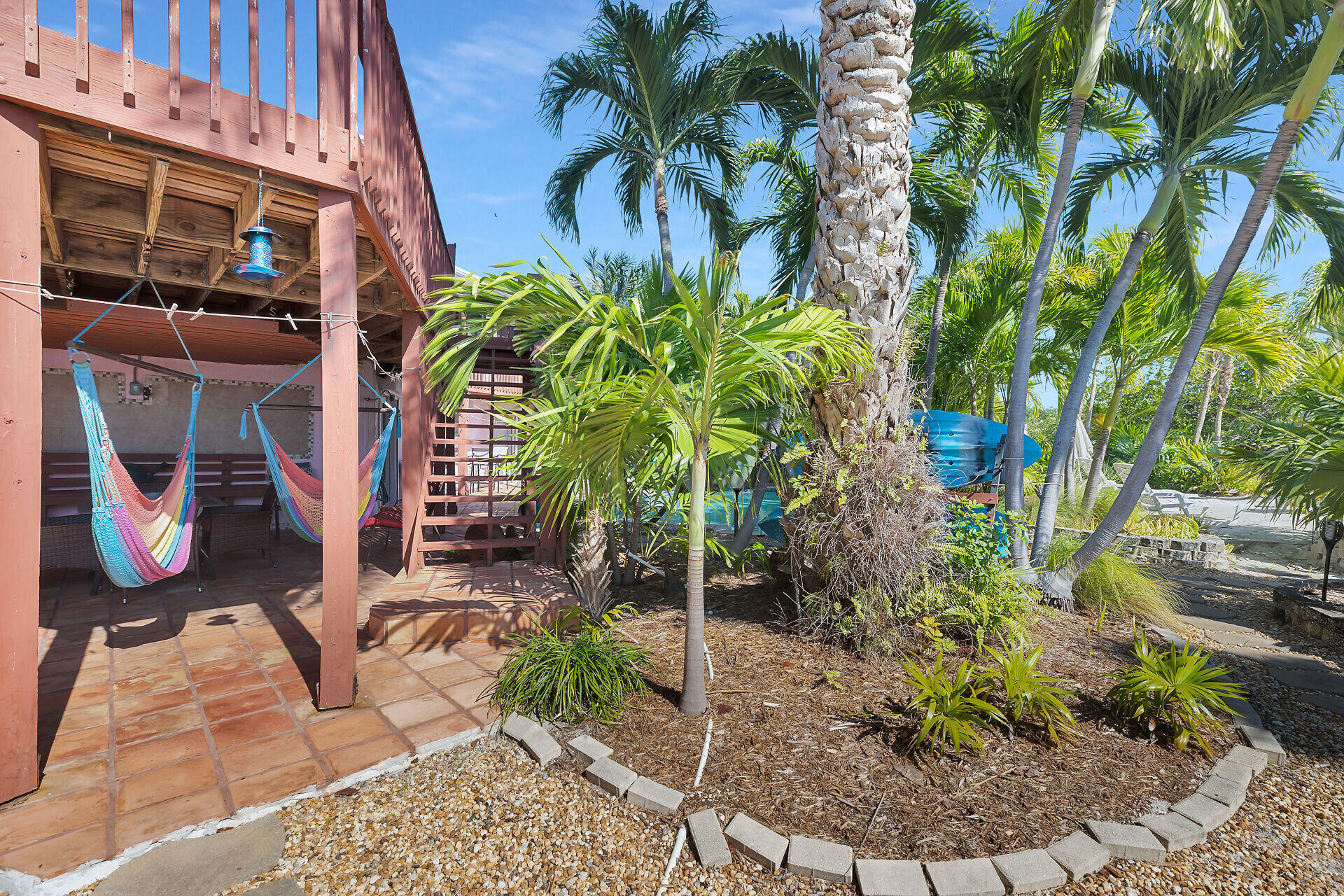 42 Treasure Road Marathon, FL 33050 - Photo 50 of 70 a backyard of a house with potted plants