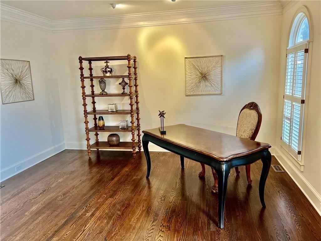 2502 Oak Hill Overlook Duluth, GA 30097 - Photo 13 of 34 a view of a workspace with furniture and wooden floor