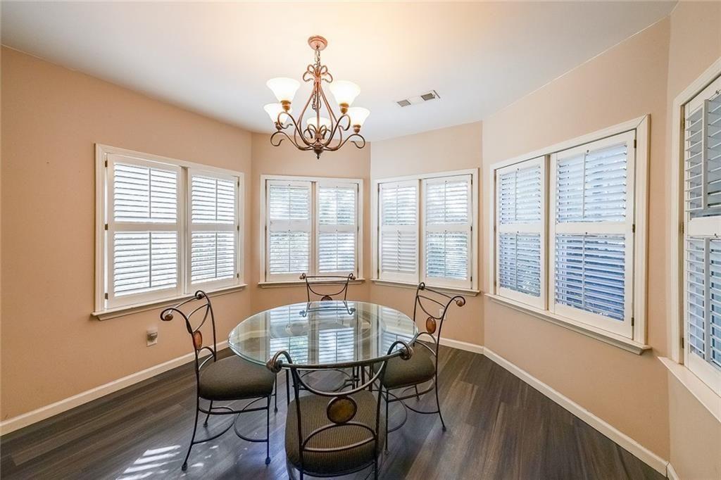 2502 Oak Hill Overlook Duluth, GA 30097 - Photo 27 of 34 a view of a dining room with furniture window and outside view