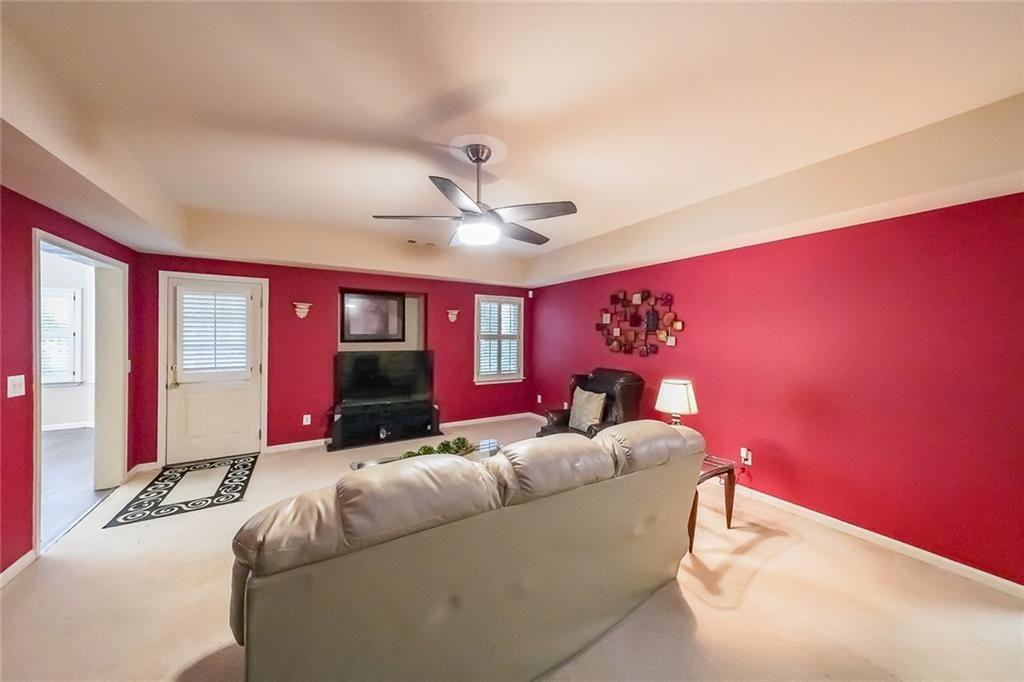 2502 Oak Hill Overlook Duluth, GA 30097 - Photo 28 of 34 a living room with furniture and window