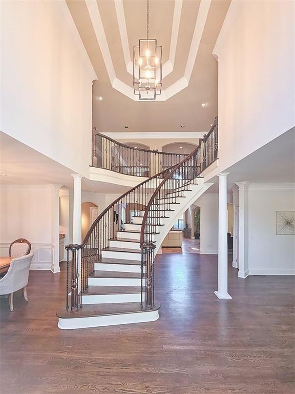 2502 Oak Hill Overlook Duluth, GA 30097 - Photo 3 of 34 a view of entryway and hall with wooden floor