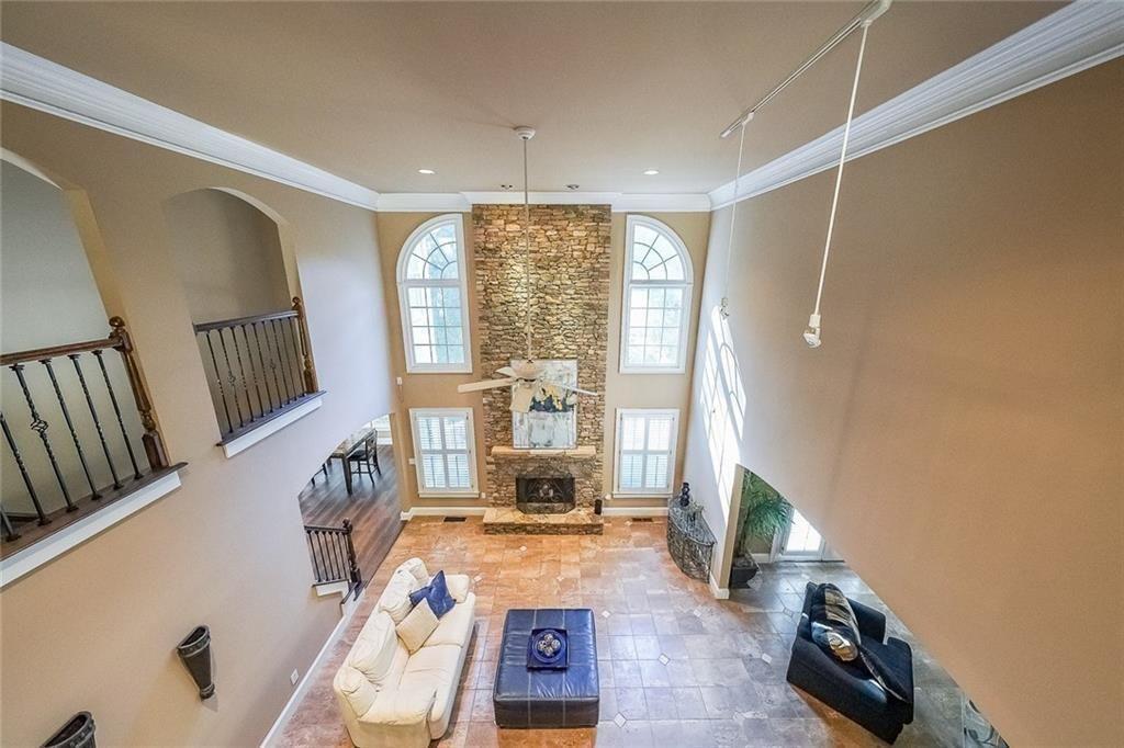 2502 Oak Hill Overlook Duluth, GA 30097 - Photo 5 of 34 a living room with furniture and a floor to ceiling window