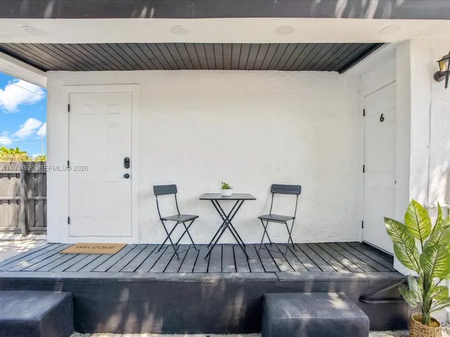 a view of a livingroom with furniture and furniture