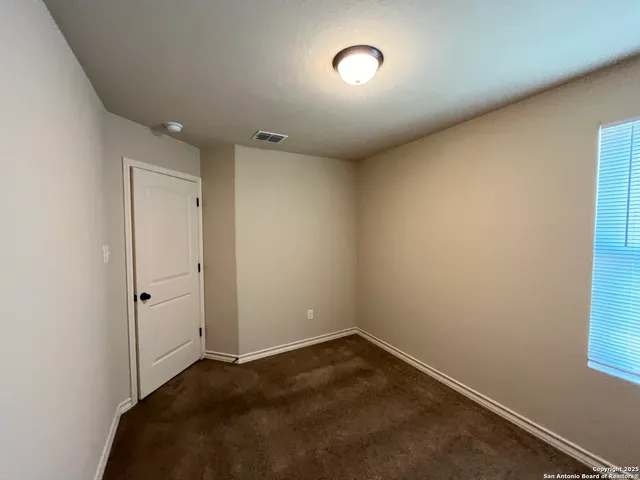 an empty room with a workbench