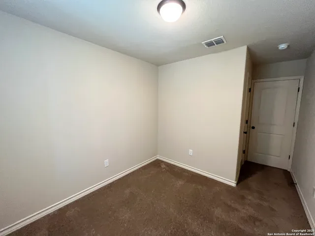 an empty room with closet