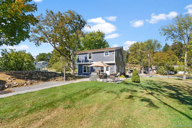 front view of a house with a small yard