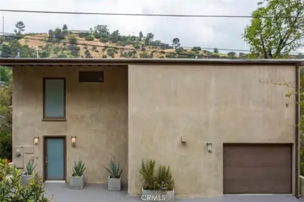 a view of a balcony and a yard