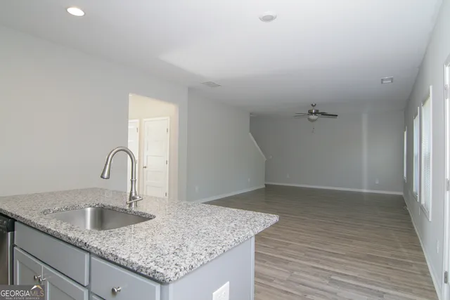a view of kitchen and windows