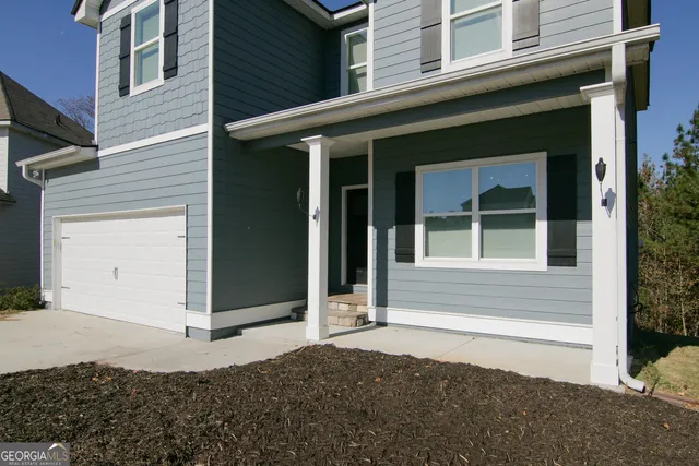 a view of house with a outdoor space