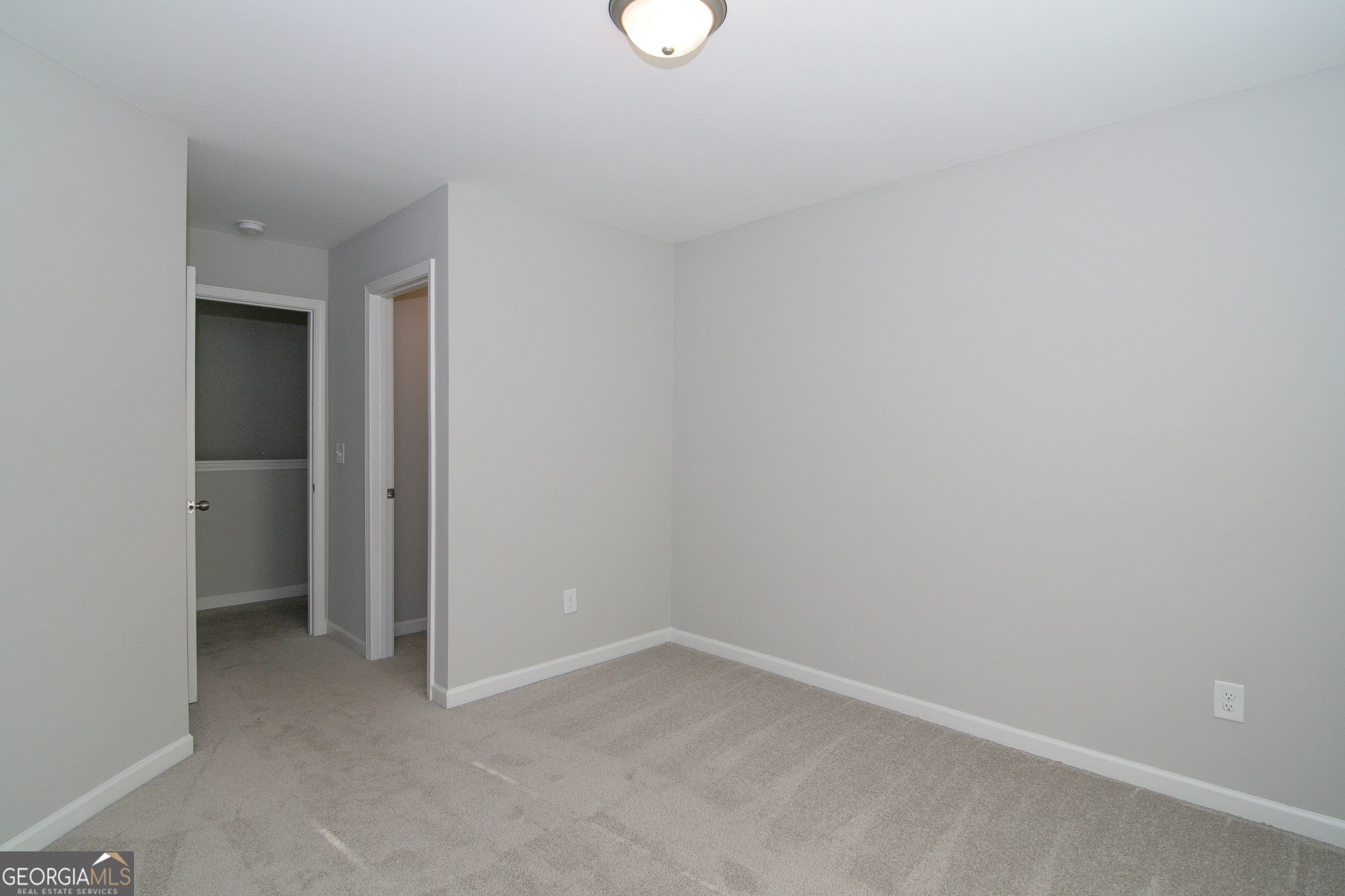 386 Springwater Way Bremen, GA 30110 - Photo 31 of 64 a view of an empty room with closet and a window