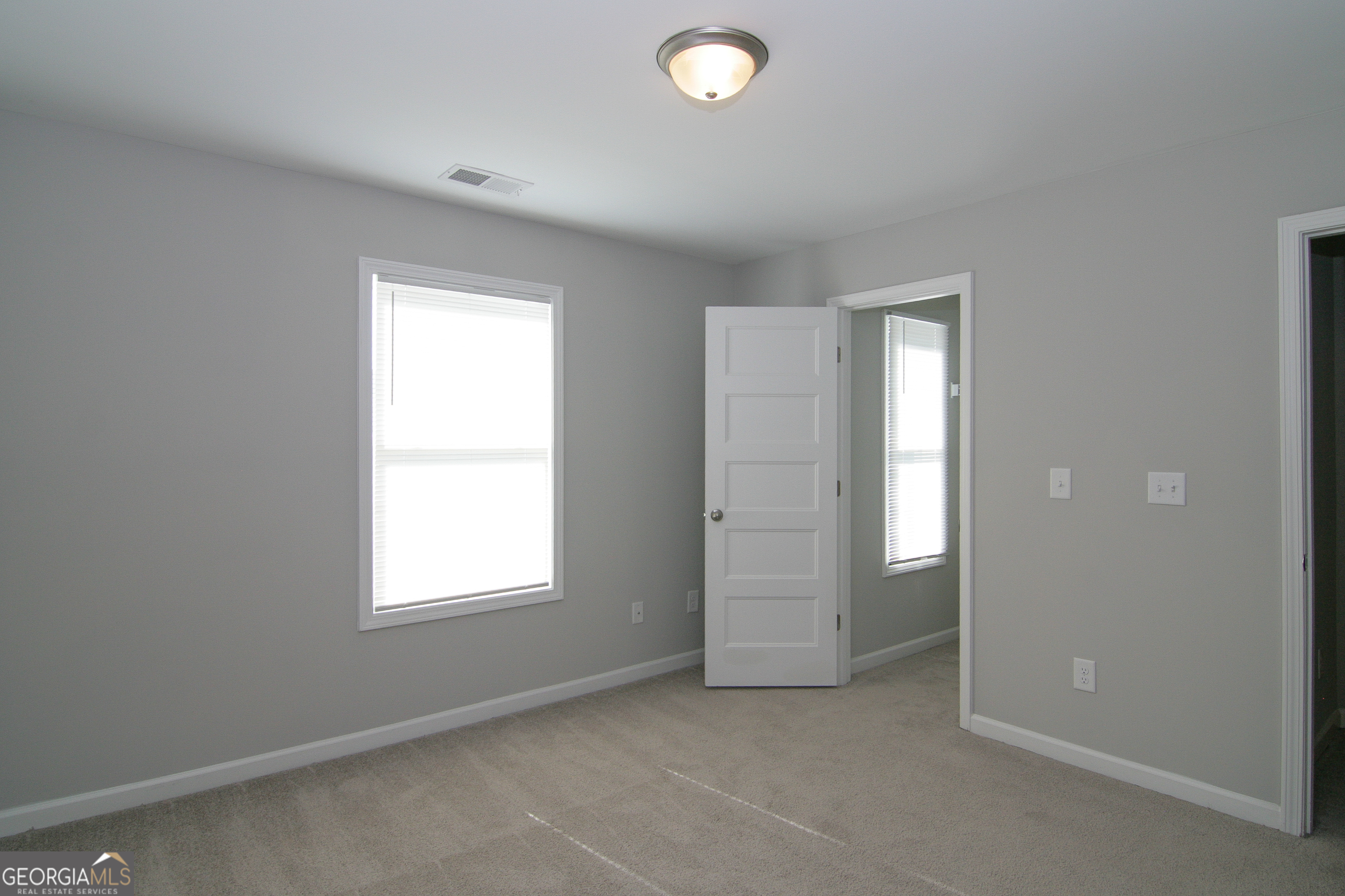 386 Springwater Way Bremen, GA 30110 - Photo 38 of 64 an empty room with windows and closet