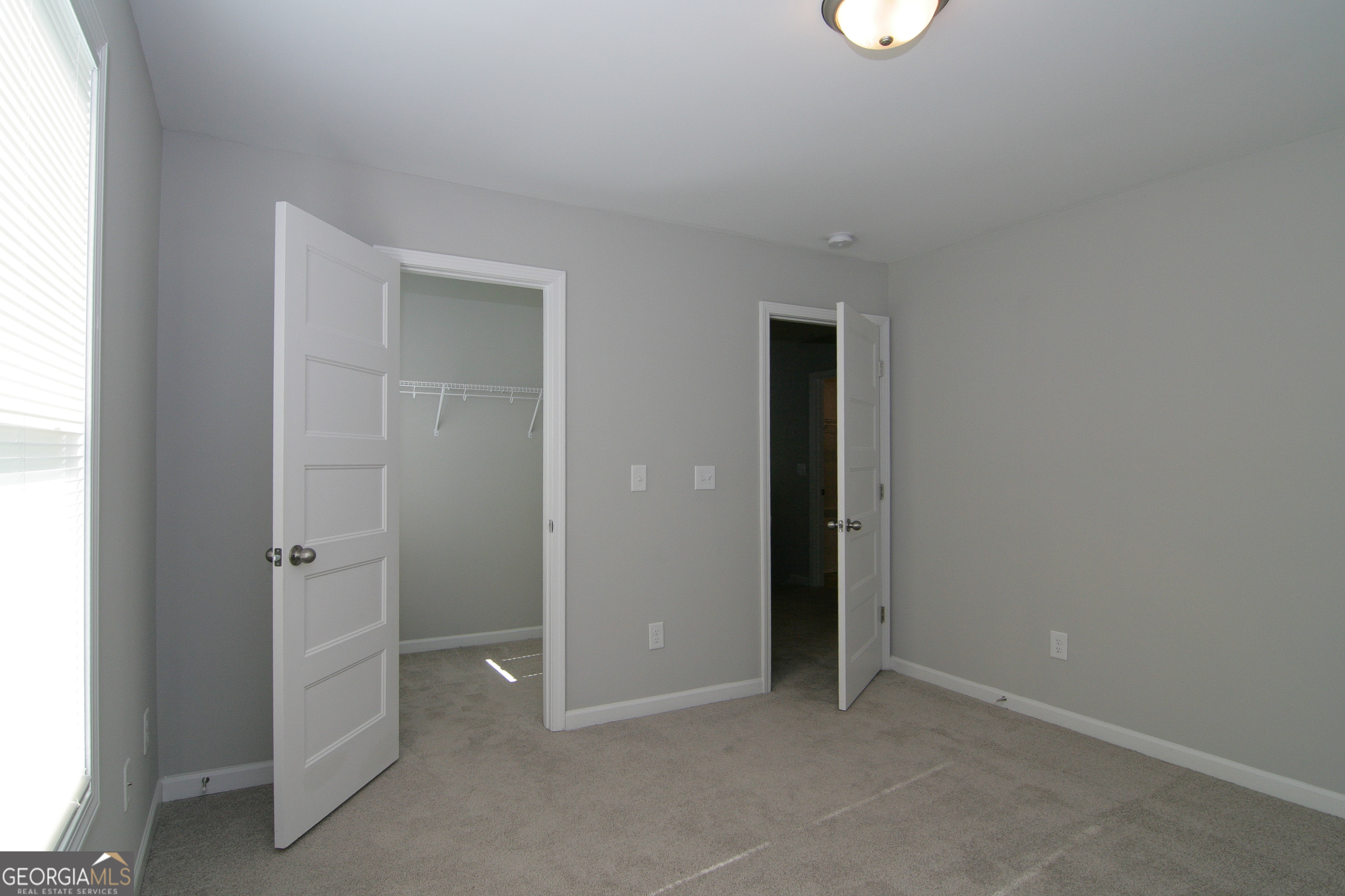 386 Springwater Way Bremen, GA 30110 - Photo 39 of 64 an empty room with closet