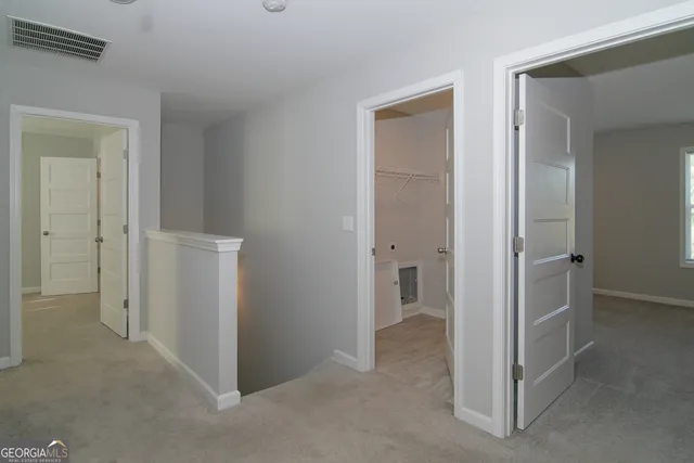 a balcony with wooden floor and fence