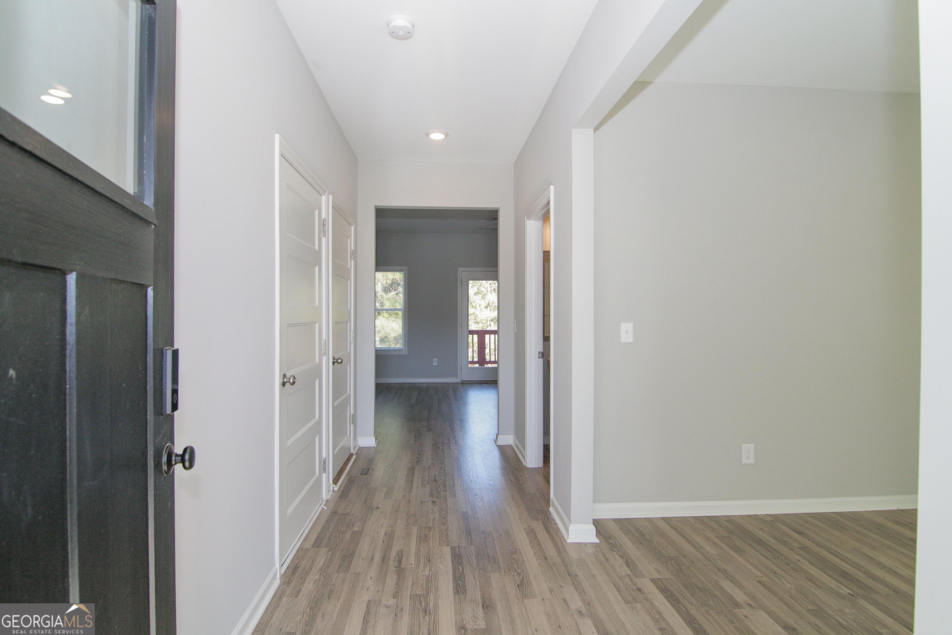 386 Springwater Way Bremen, GA 30110 - Photo 5 of 64 a view of a hallway with wooden floor
