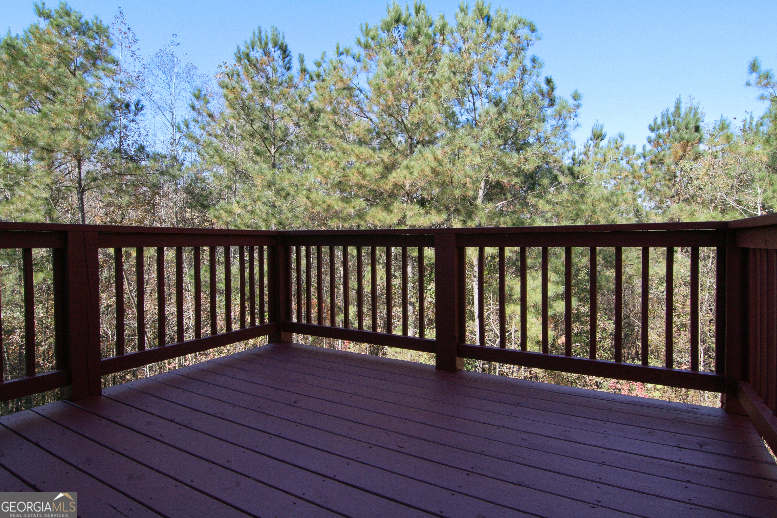 386 Springwater Way Bremen, GA 30110 - Photo 53 of 64 a balcony with wooden floor and fence