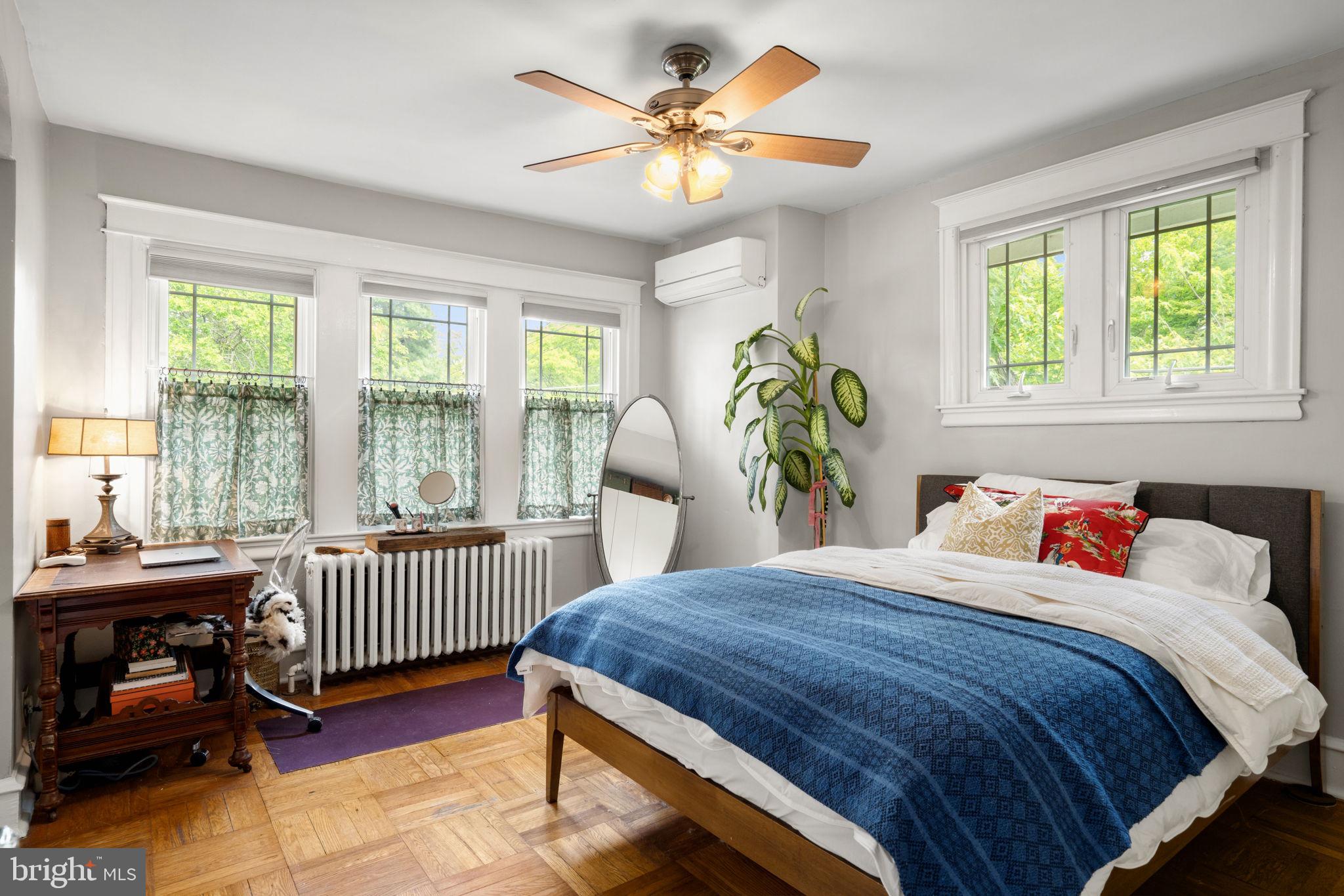 156 Roumfort Road Philadelphia, PA 19119 - Photo 5 of 56 a bedroom with a bed and a window