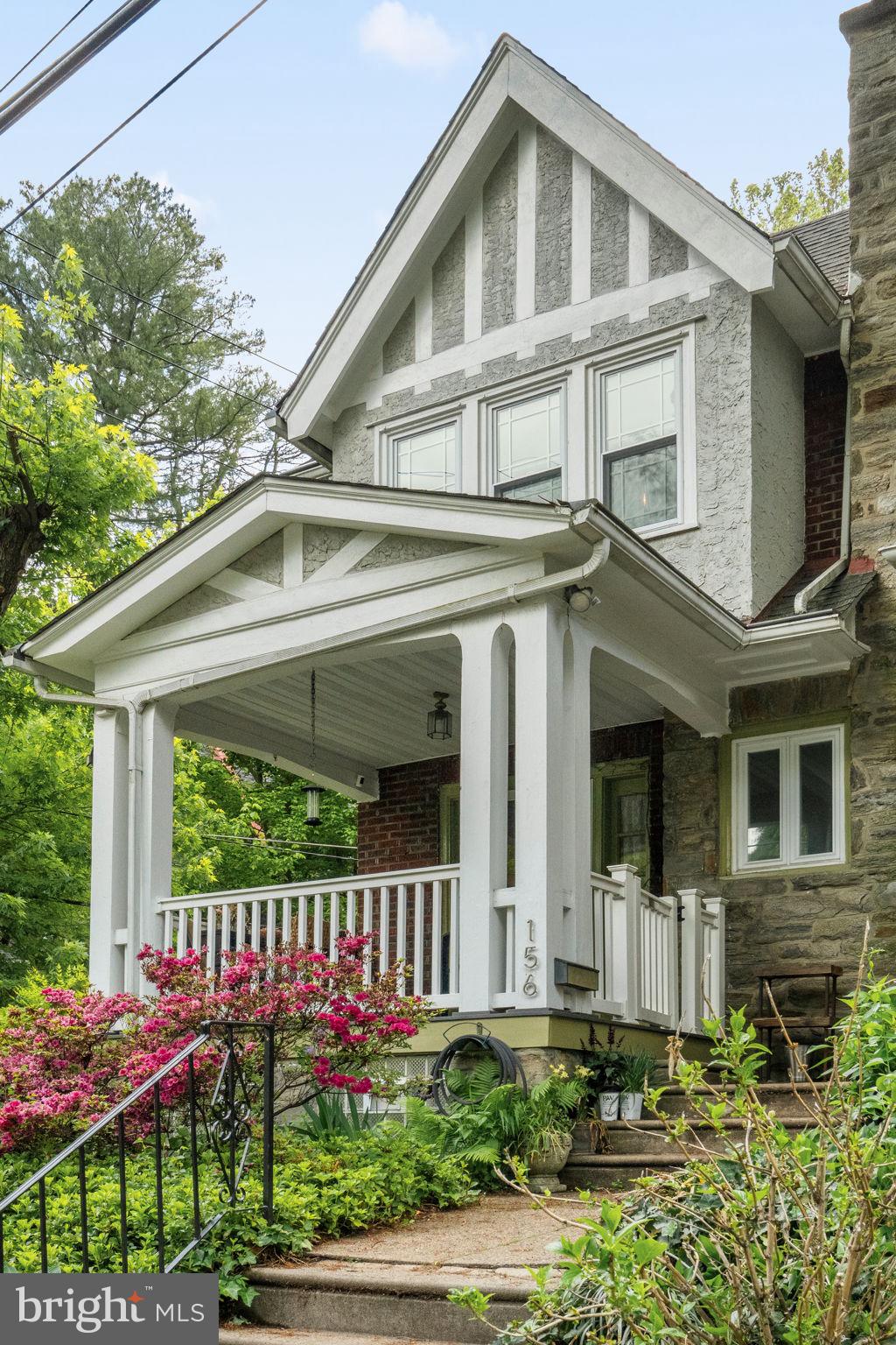 156 Roumfort Road Philadelphia, PA 19119 - Photo 8 of 56 a front view of a house with garden