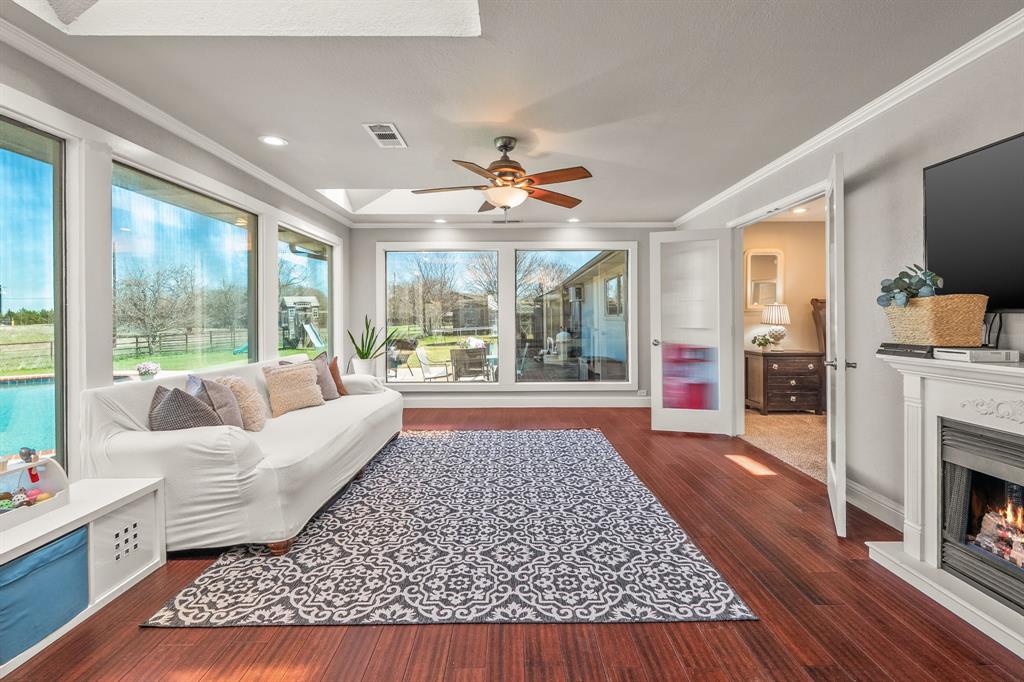 1673 Roadrunner Road Anna, TX 75409 - Photo 29 of 40 Second living room with wall of windows