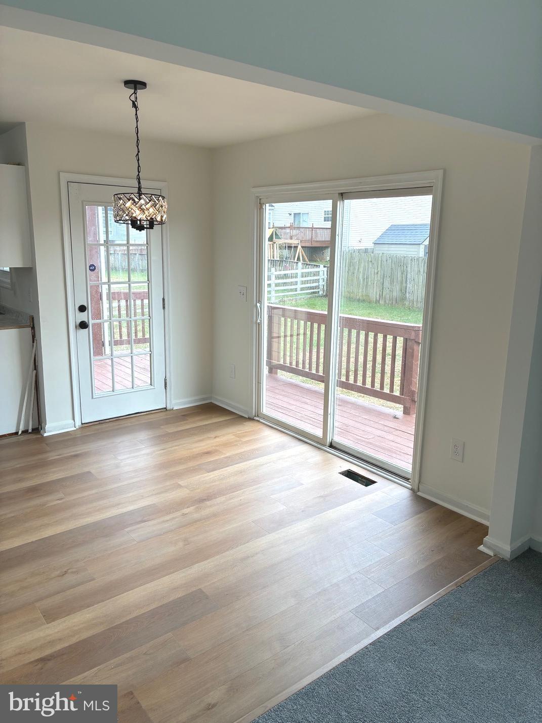 331 North Teal Road Martinsburg, WV 25405 - Photo 12 of 35 a view of a room with wooden floor and windows