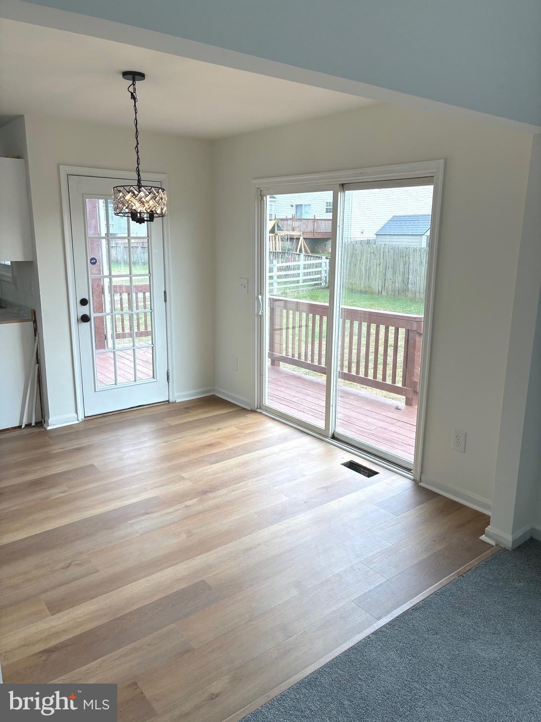 331 North Teal Road Martinsburg, WV 25405 - Photo 13 of 35 a view of a room with wooden floor and windows