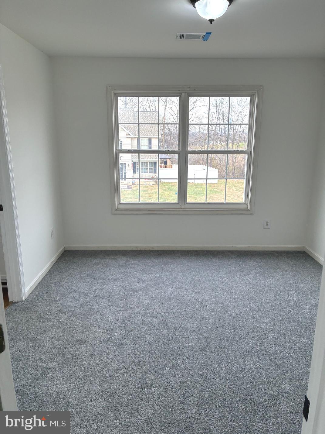 331 North Teal Road Martinsburg, WV 25405 - Photo 31 of 35 an empty room with a window