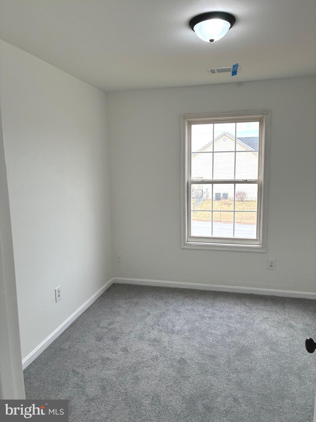 331 North Teal Road Martinsburg, WV 25405 - Photo 32 of 35 an empty room with a window