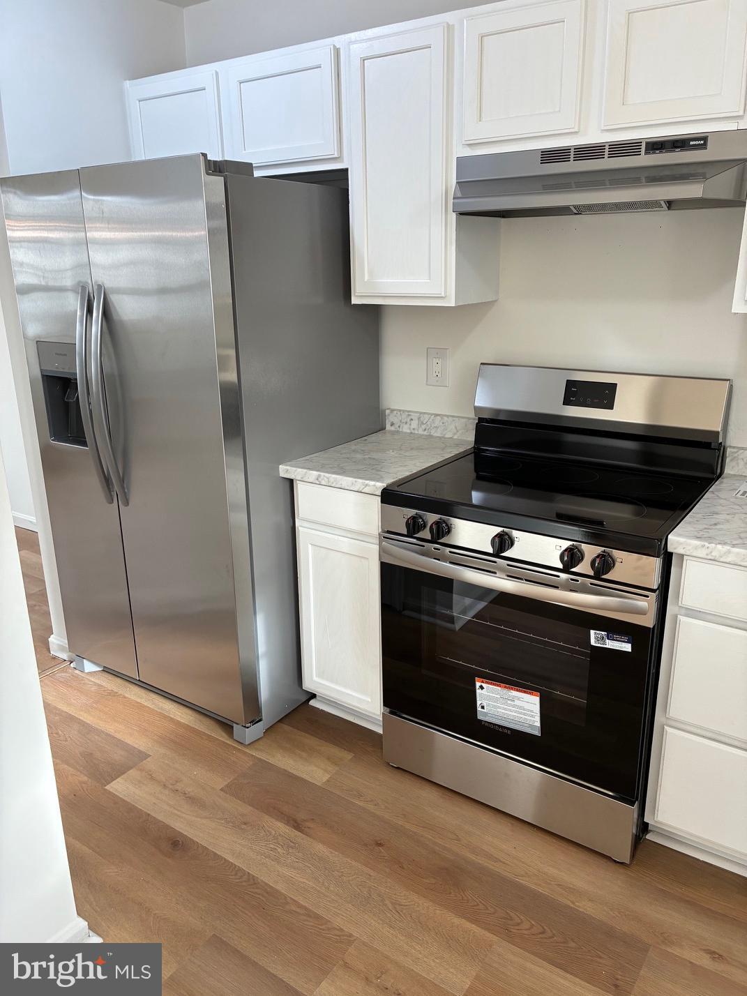 331 North Teal Road Martinsburg, WV 25405 - Photo 10 of 35 a stove top oven sitting inside of a kitchen
