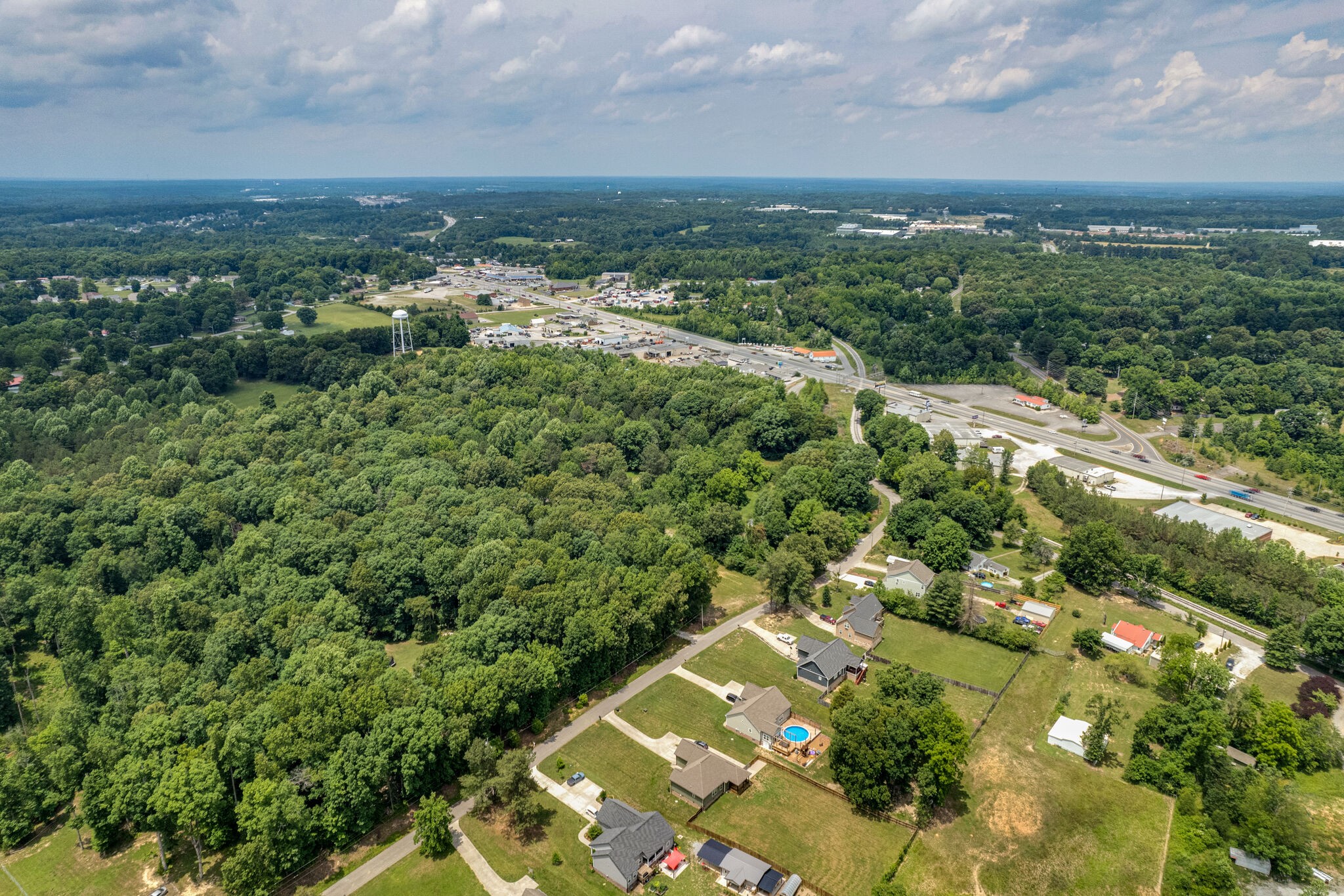419 Kaiser Road Dickson, TN 37055 - Photo 37 of 38 a view of a city with lush green forest