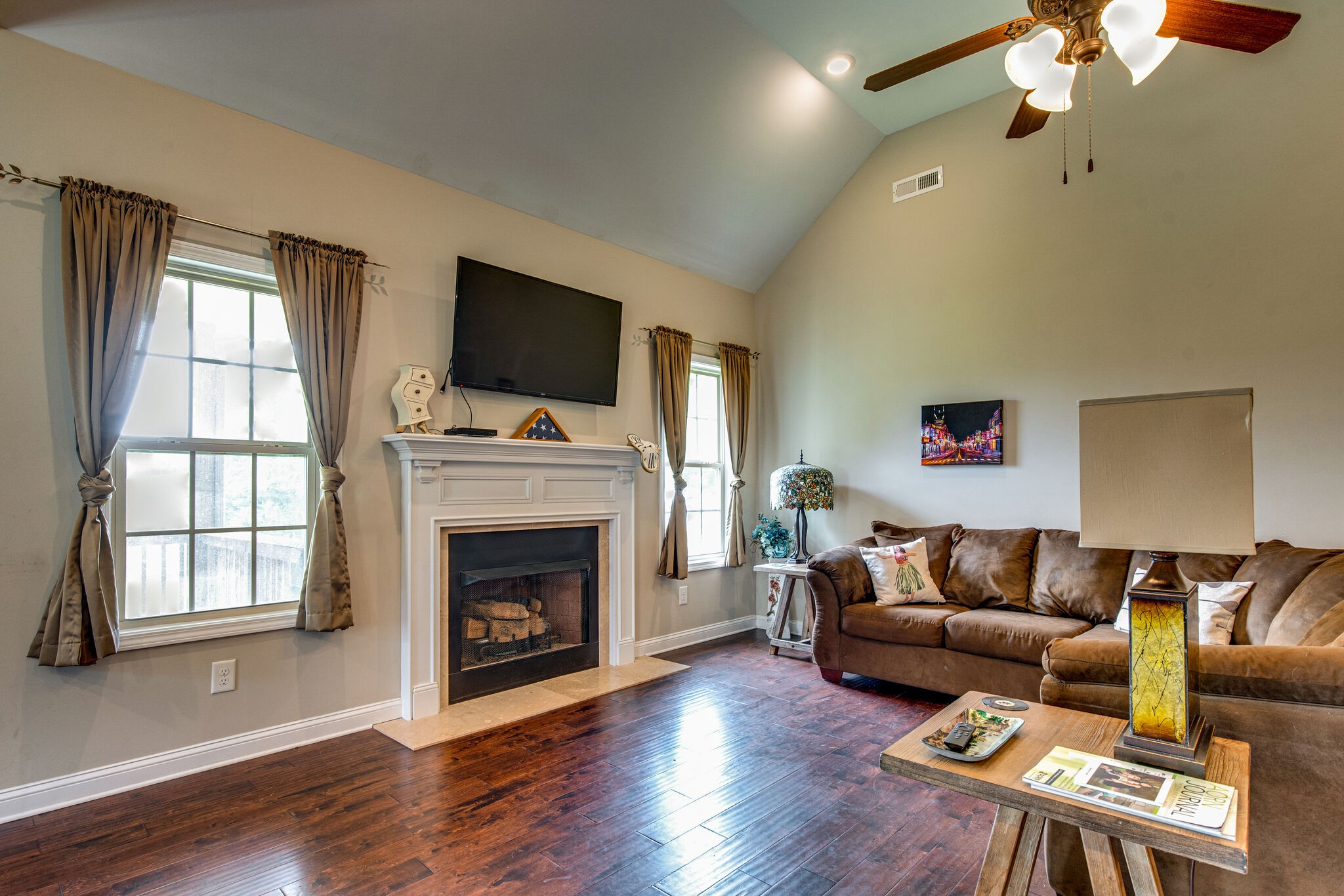 419 Kaiser Road Dickson, TN 37055 - Photo 5 of 38 a living room with furniture fireplace and flat screen tv