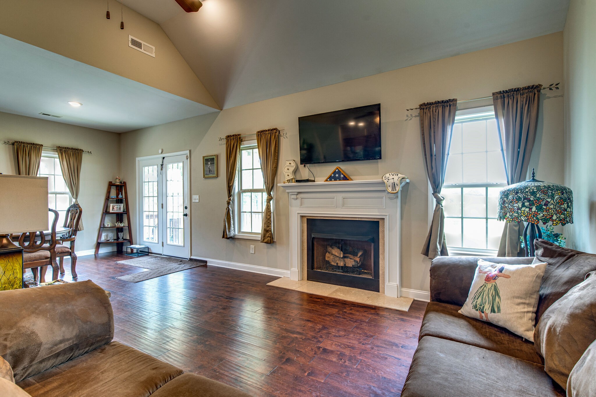 419 Kaiser Road Dickson, TN 37055 - Photo 6 of 38 a living room with furniture fireplace and flat screen tv