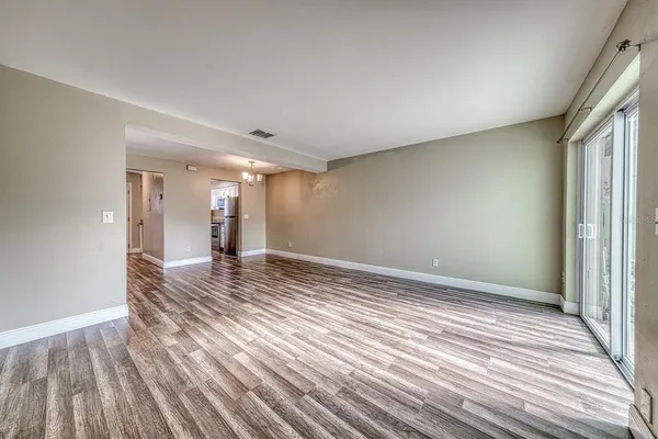 a view of an empty room and window