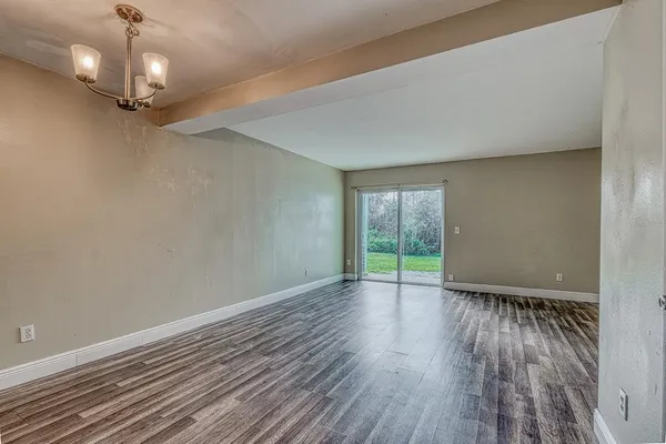 a view of livingroom with hardwood floor and window