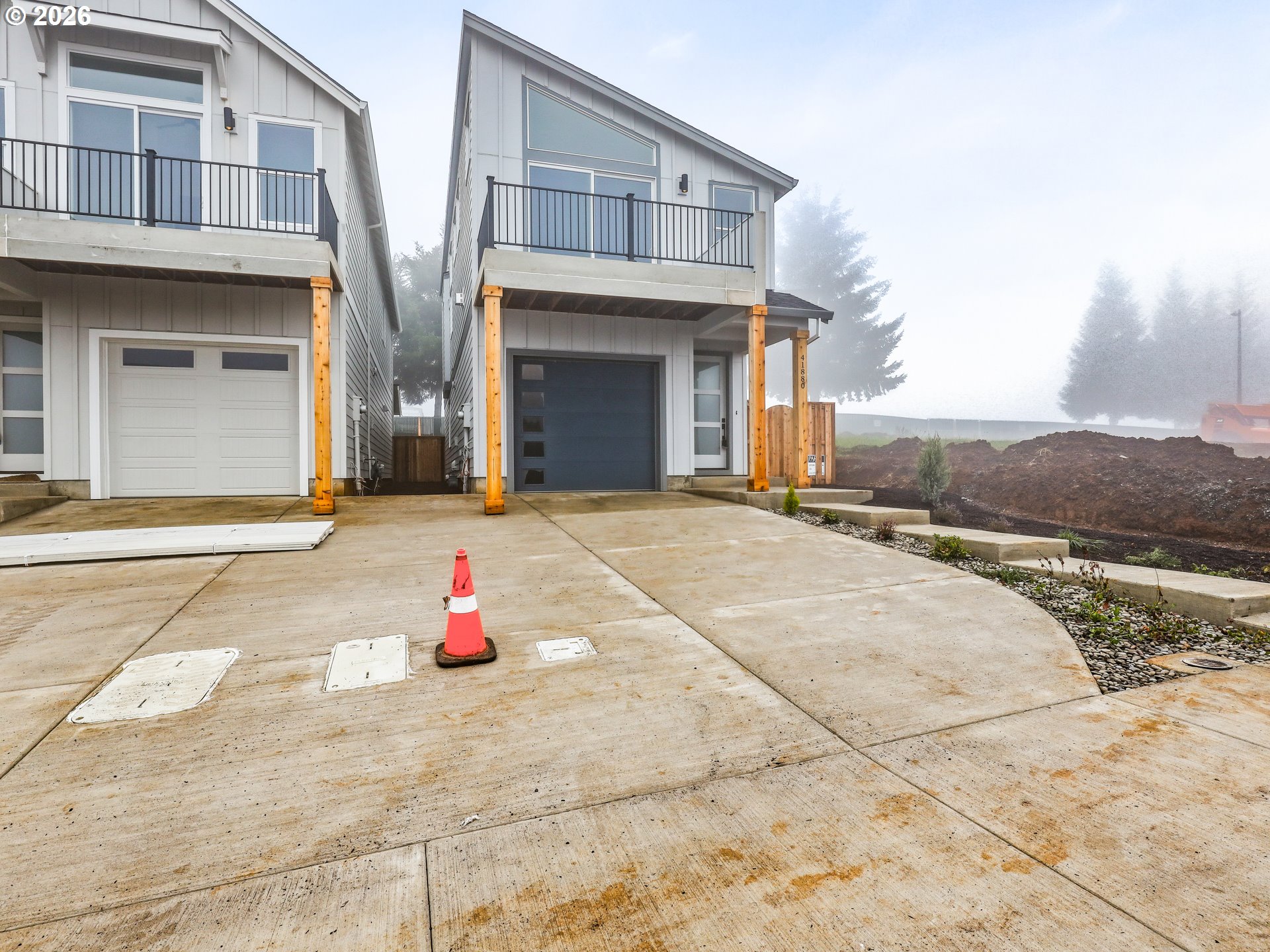 41870 Deschutes Avenue, Unit 11 Sandy, OR 97055 - Photo 12 of 43 a street with view of residential houses
