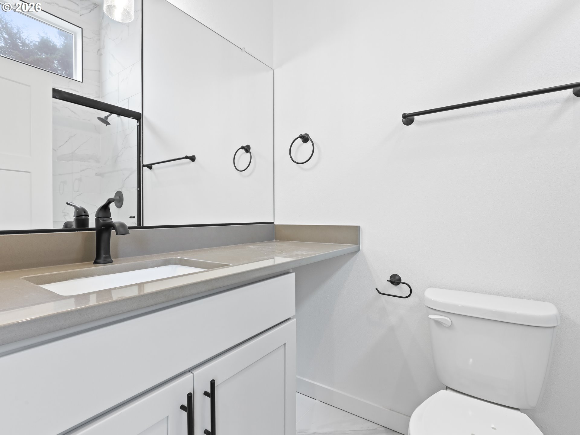 41870 Deschutes Avenue, Unit 11 Sandy, OR 97055 - Photo 22 of 43 a bathroom with a granite countertop sink a toilet and a mirror