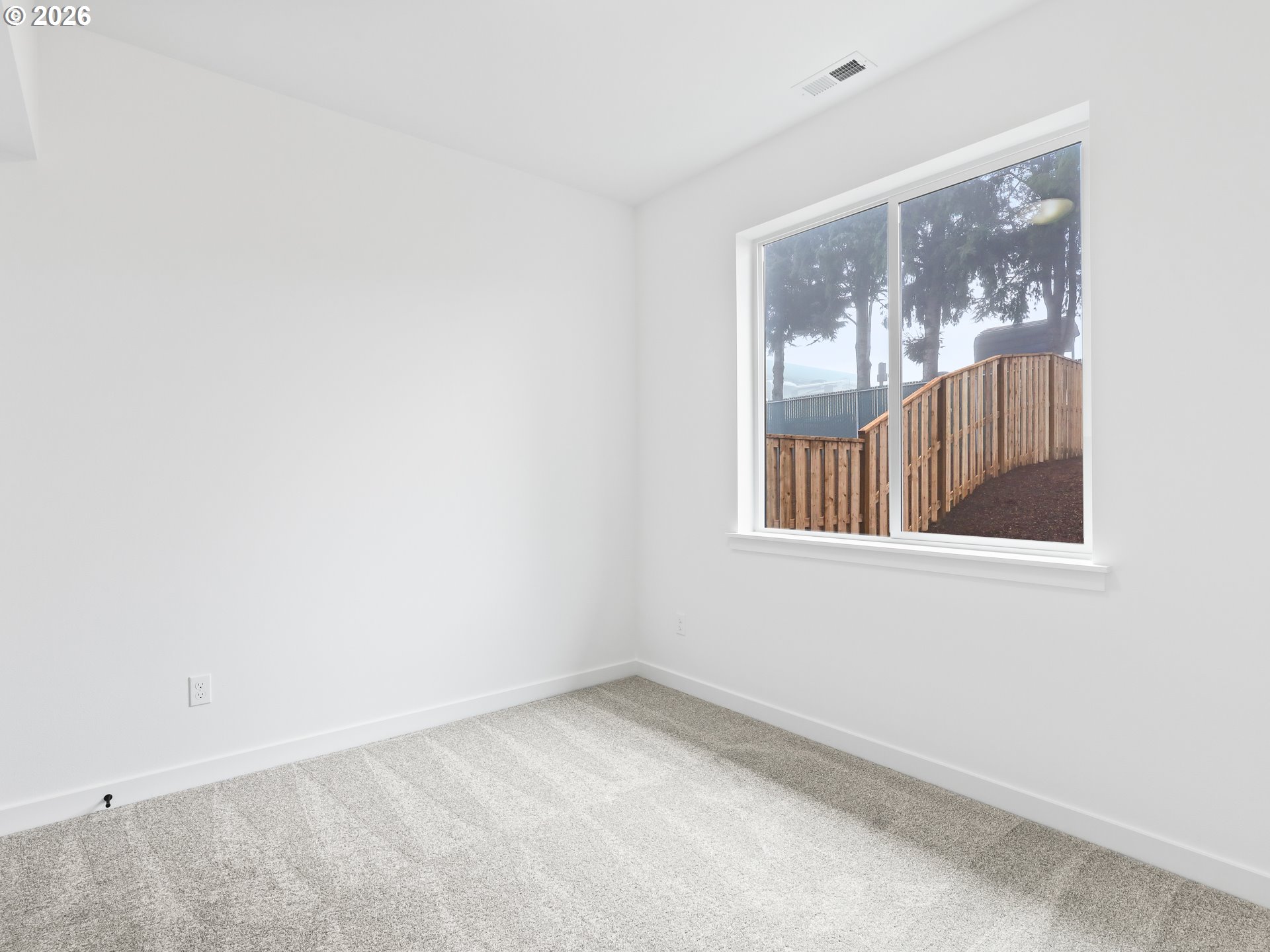 41870 Deschutes Avenue, Unit 11 Sandy, OR 97055 - Photo 29 of 43 a view of an empty room with a window