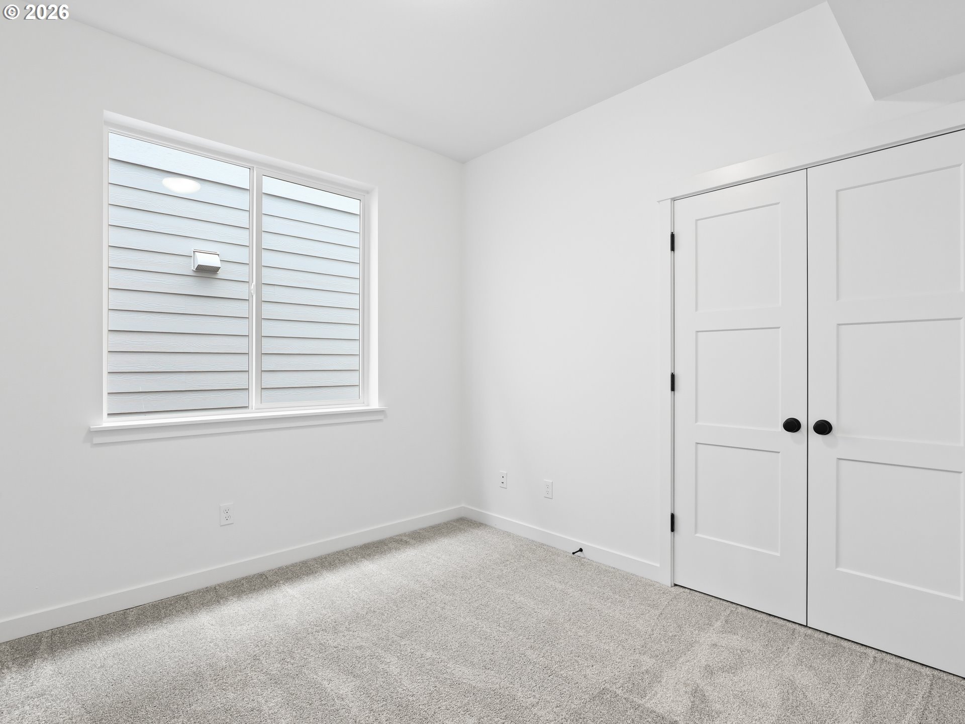 41870 Deschutes Avenue, Unit 11 Sandy, OR 97055 - Photo 33 of 43 a view of an empty room with a window