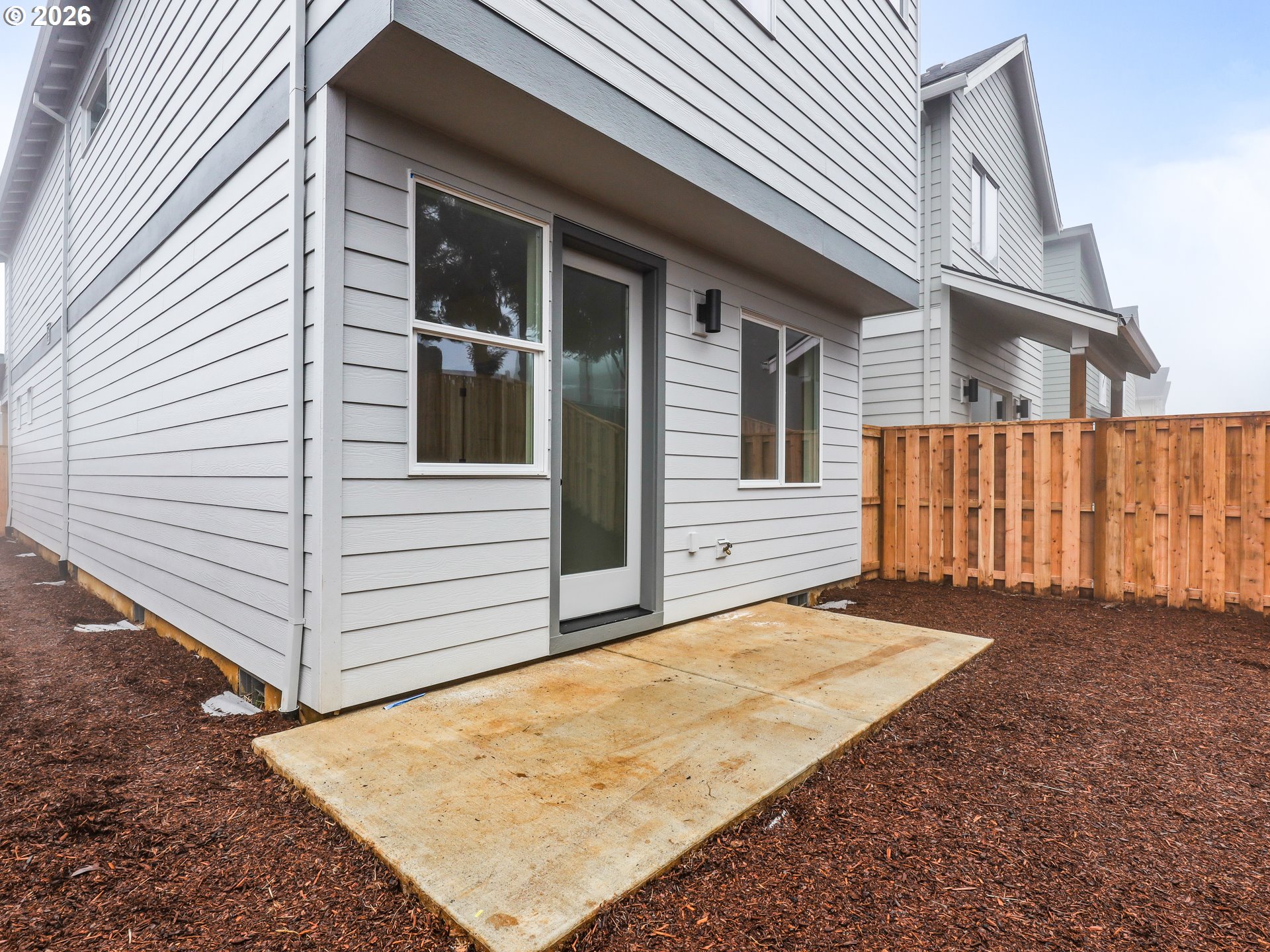 41870 Deschutes Avenue, Unit 11 Sandy, OR 97055 - Photo 39 of 43 a view of a house with a backyard