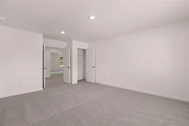 an aerial view of a house with a lake view